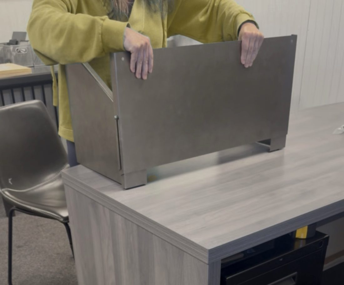 Step 2: Release the front shield